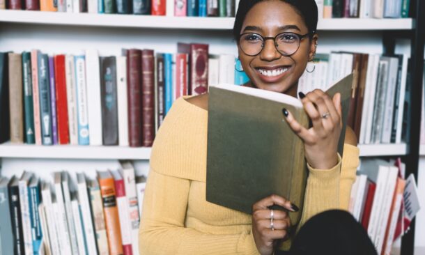 Positive,African,American,Young,Woman,In,Eyeglasses,For,Vision,Correction