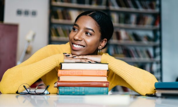 Positive,African,American,Young,Woman,Dressed,In,Casual,Wear,Laughing