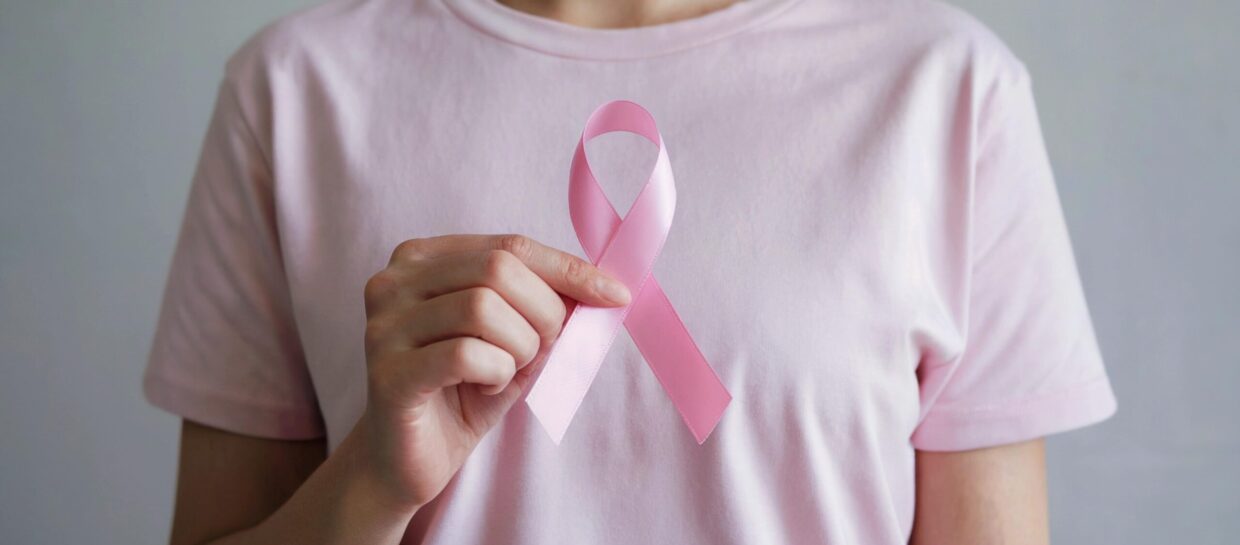 Woman,Hold,Pink,Ribbon,Breast,Cancer,Awareness.,Female,Health,Check